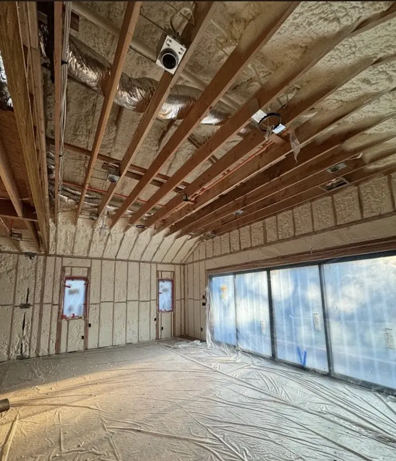 Interior walls and ceiling insulated with spray foam during new construction in Decatur